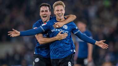 Christopher Lannert (L) and Sam Schreck of Bielefeld celebrate 